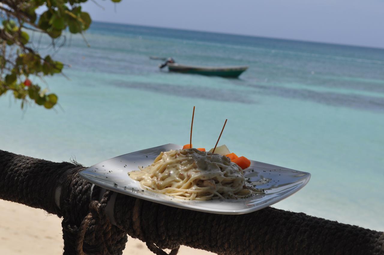 Paradise Island Beach Resort Punta Rucia Esterno foto